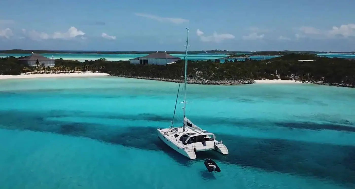 The Magic Bus catamaran sailing with full canvas up