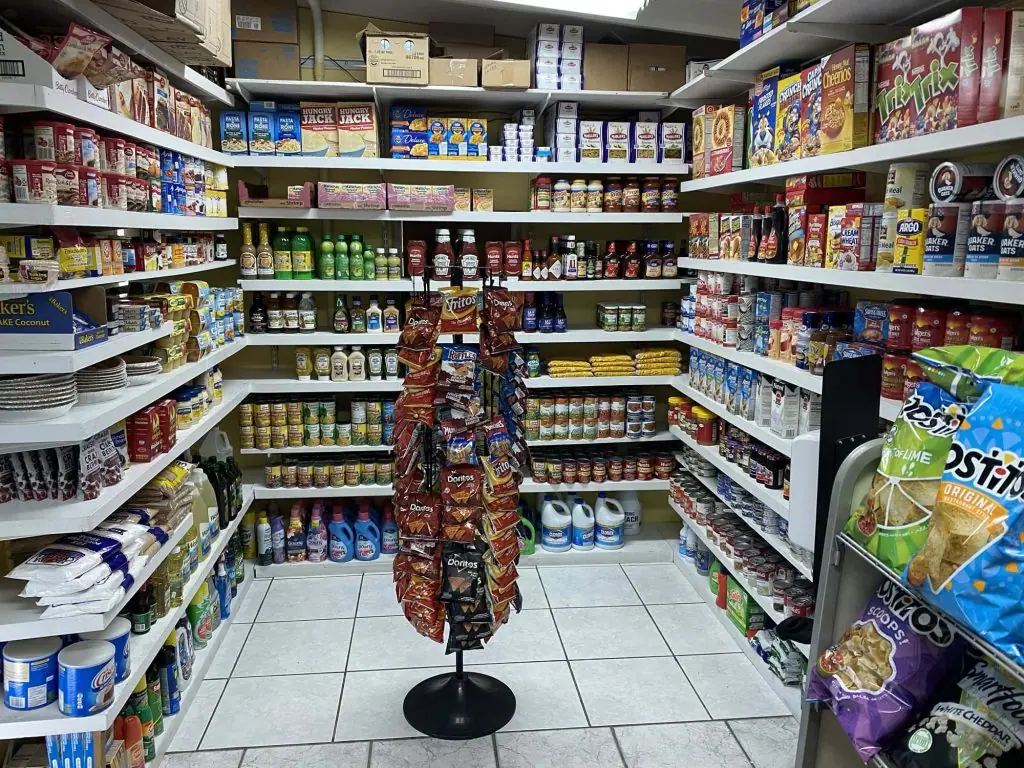 Packaged staples and household supplies on the store shelves in Staniel Cay.