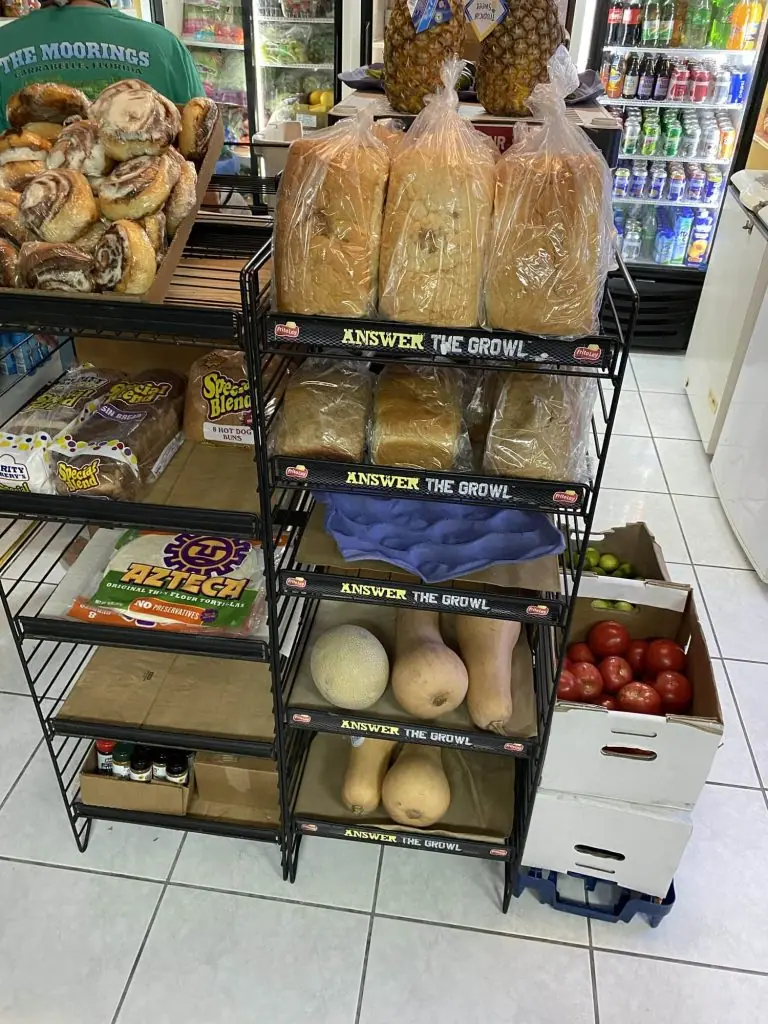 Tall shelving unit of groceries in the Staniel Cay store.